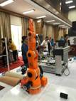 ''A picture containing indoor, orange, ceiling, tool

Description automatically generated''